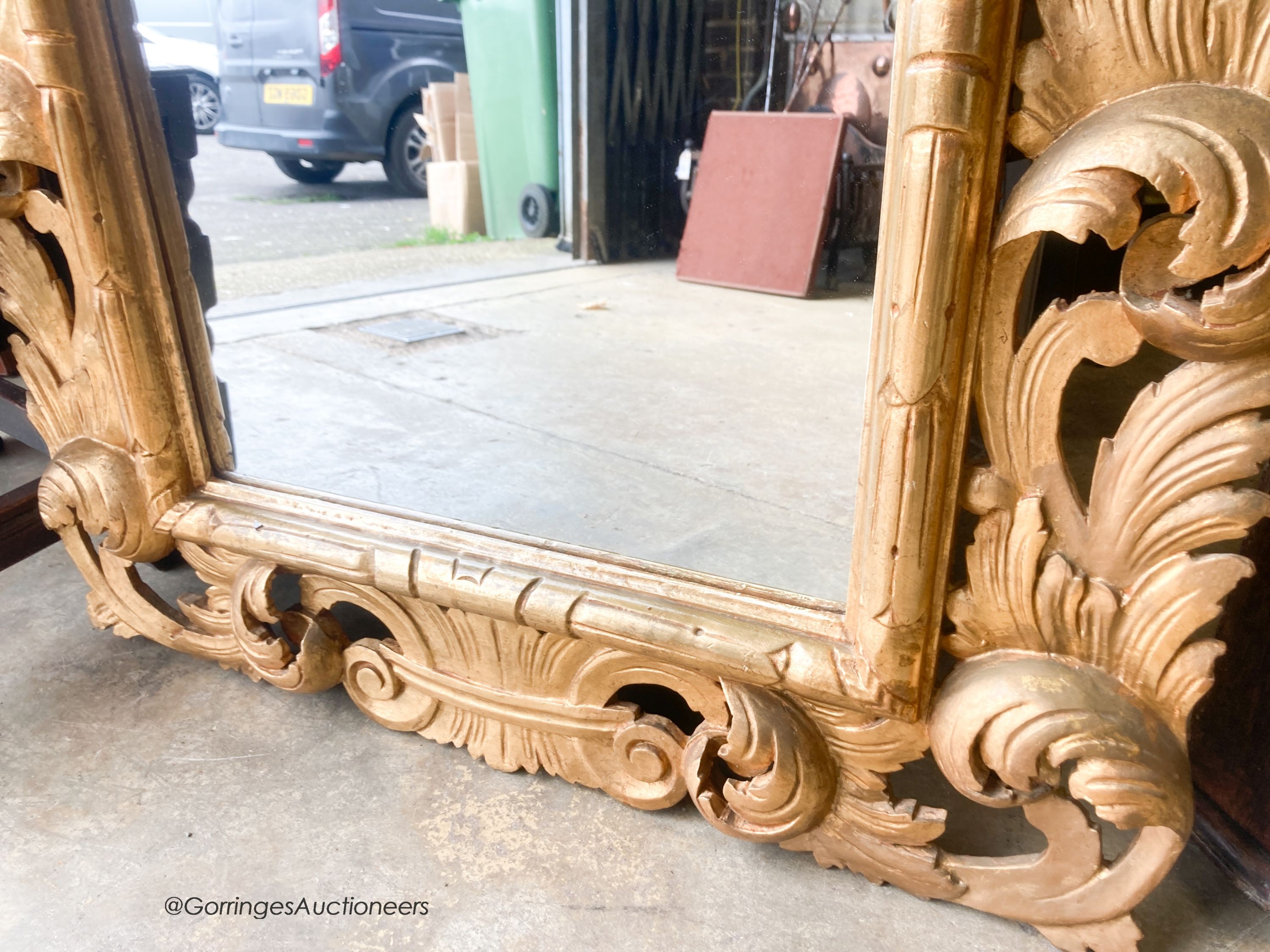 A 20th century Florentine style gilt wood mirror, width 84cm, height 107cm